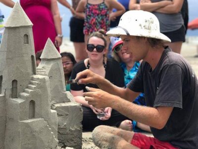 Free sandcastle building lessons on Galveston beach